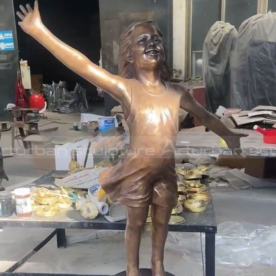 happy girl statue