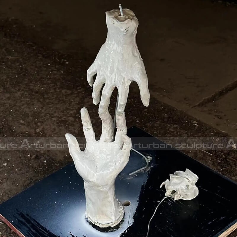 bronze hand statue