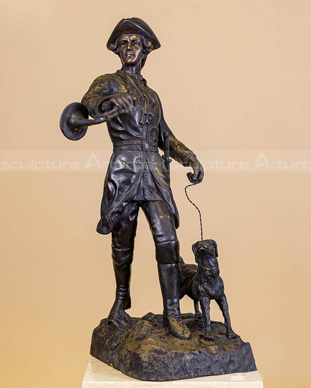 hunter and dog sculpture