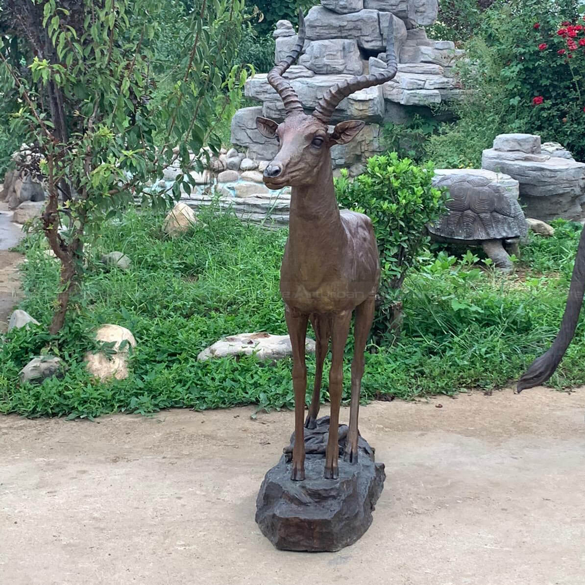 brass antelope statue