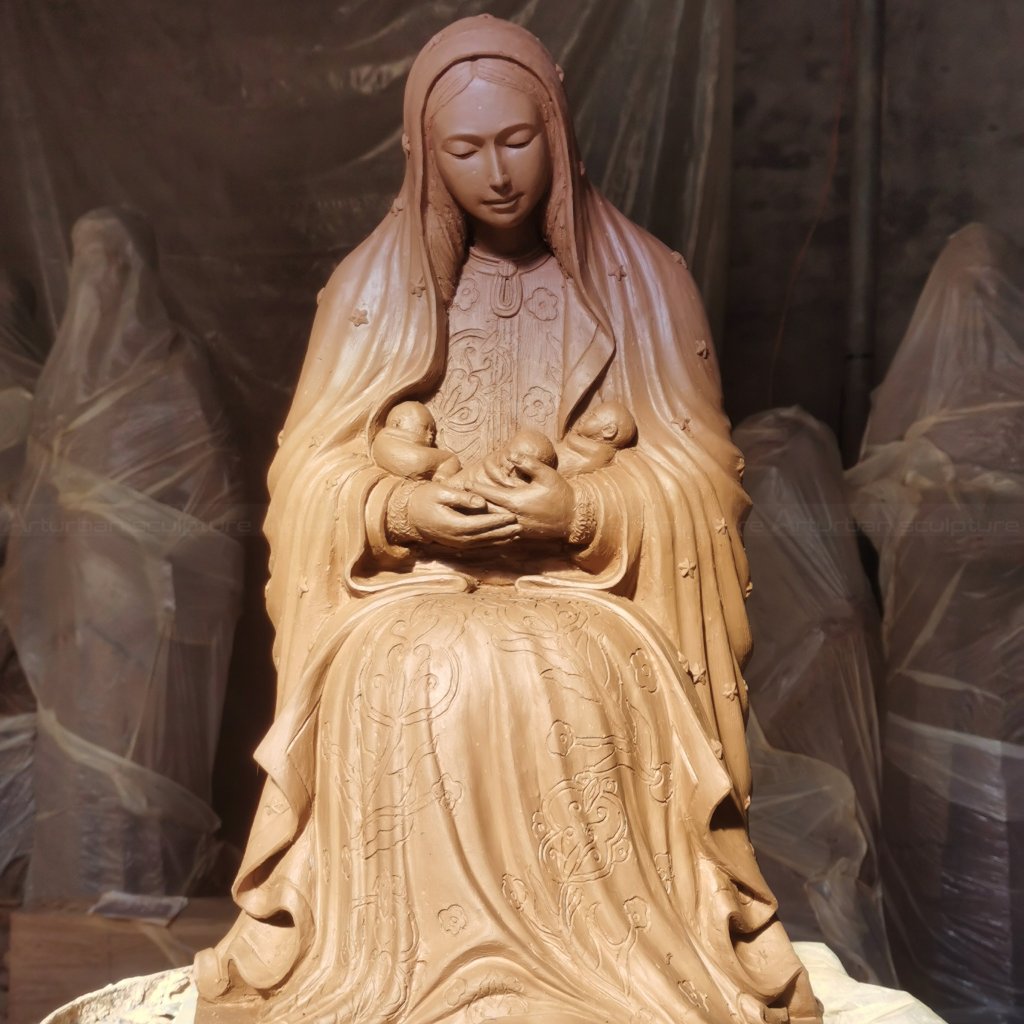 mary with child statue clay mold