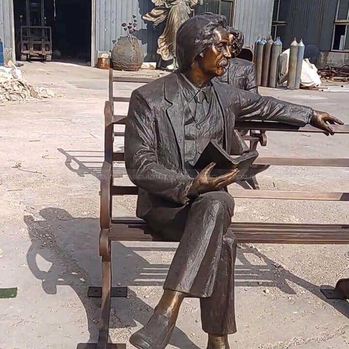 Man on Bench statue