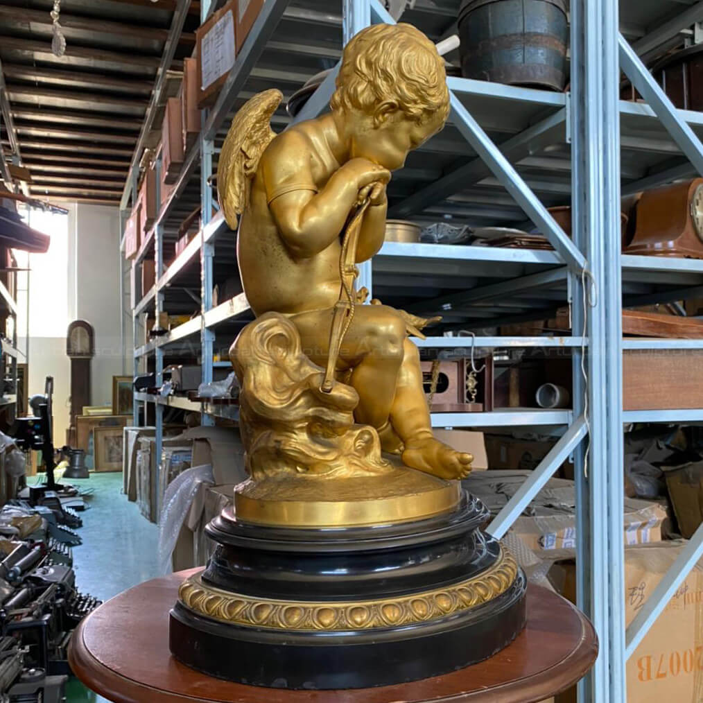 Golden Cupid Sculpture