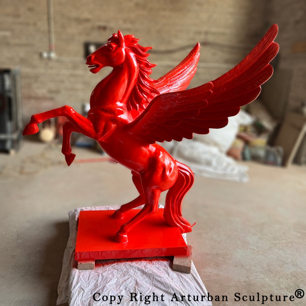 life size red pegasus animal sculpture