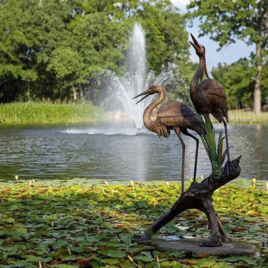 Bronze Garden Herons