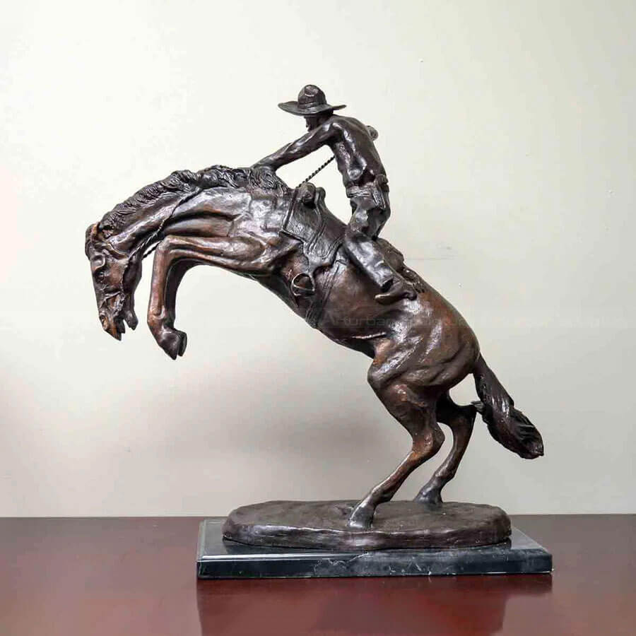 Cowboy On Bucking Horse Statue