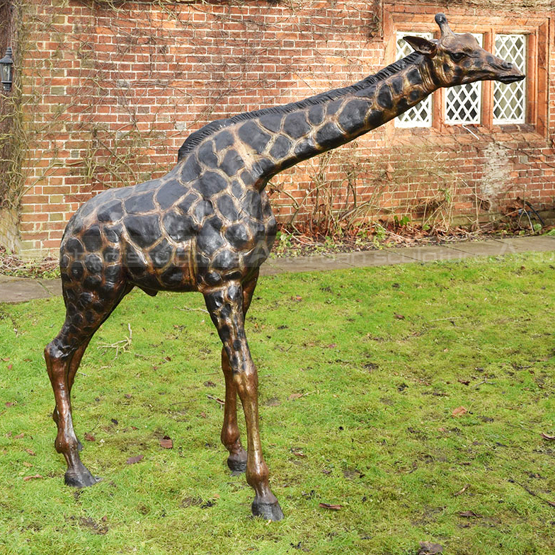 Large Outdoor reticulated Giraffe Statue featuring a detailed geometric coat pattern, long neck