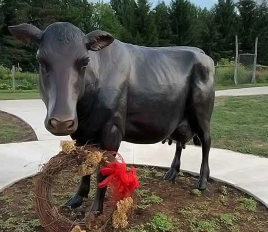 standing cow statue