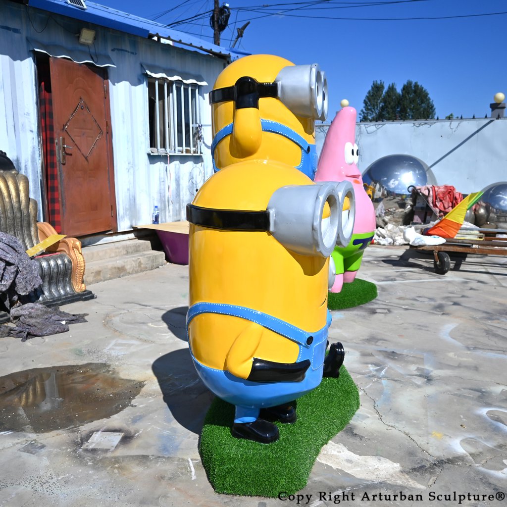 3 minion statue