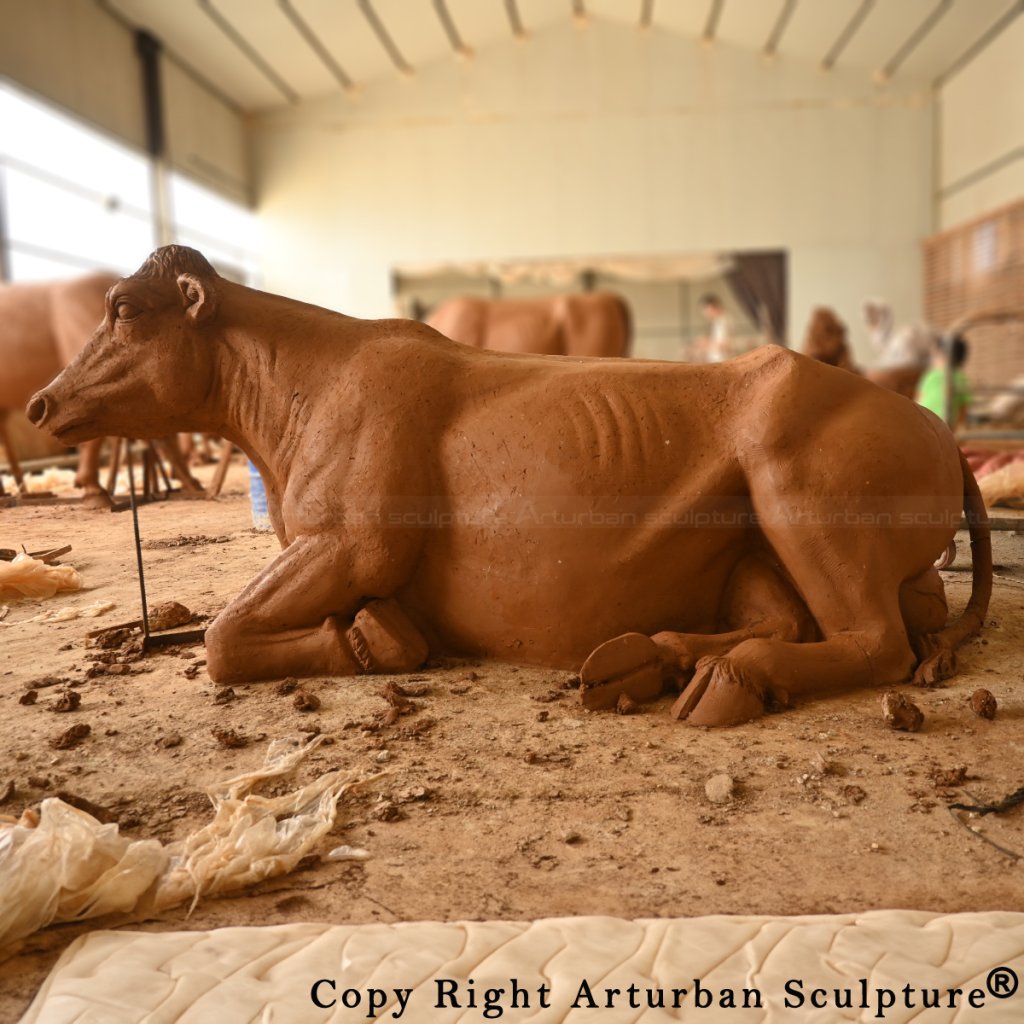 Clay Mold of cow lying statue