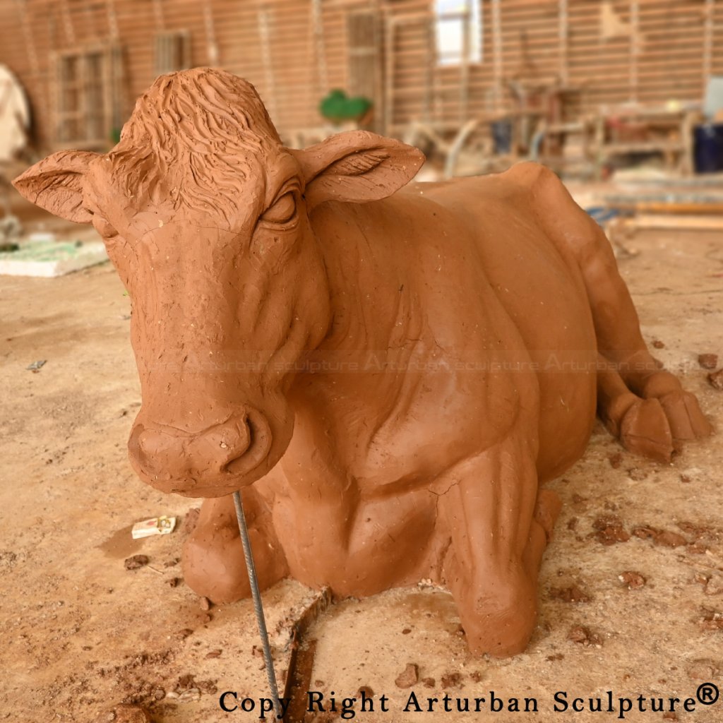 Clay Mold of cow lying statue