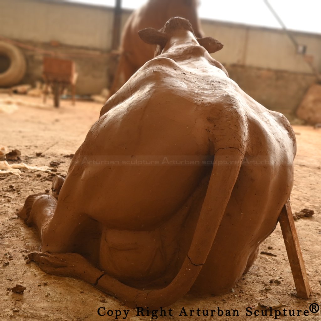 Clay Mold of cow lying statue