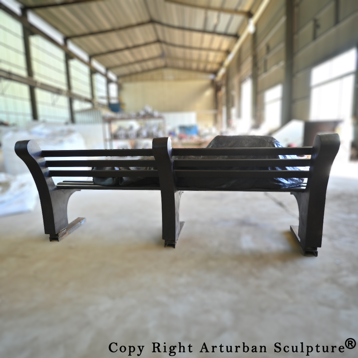 Jesus on Bench Sculpture