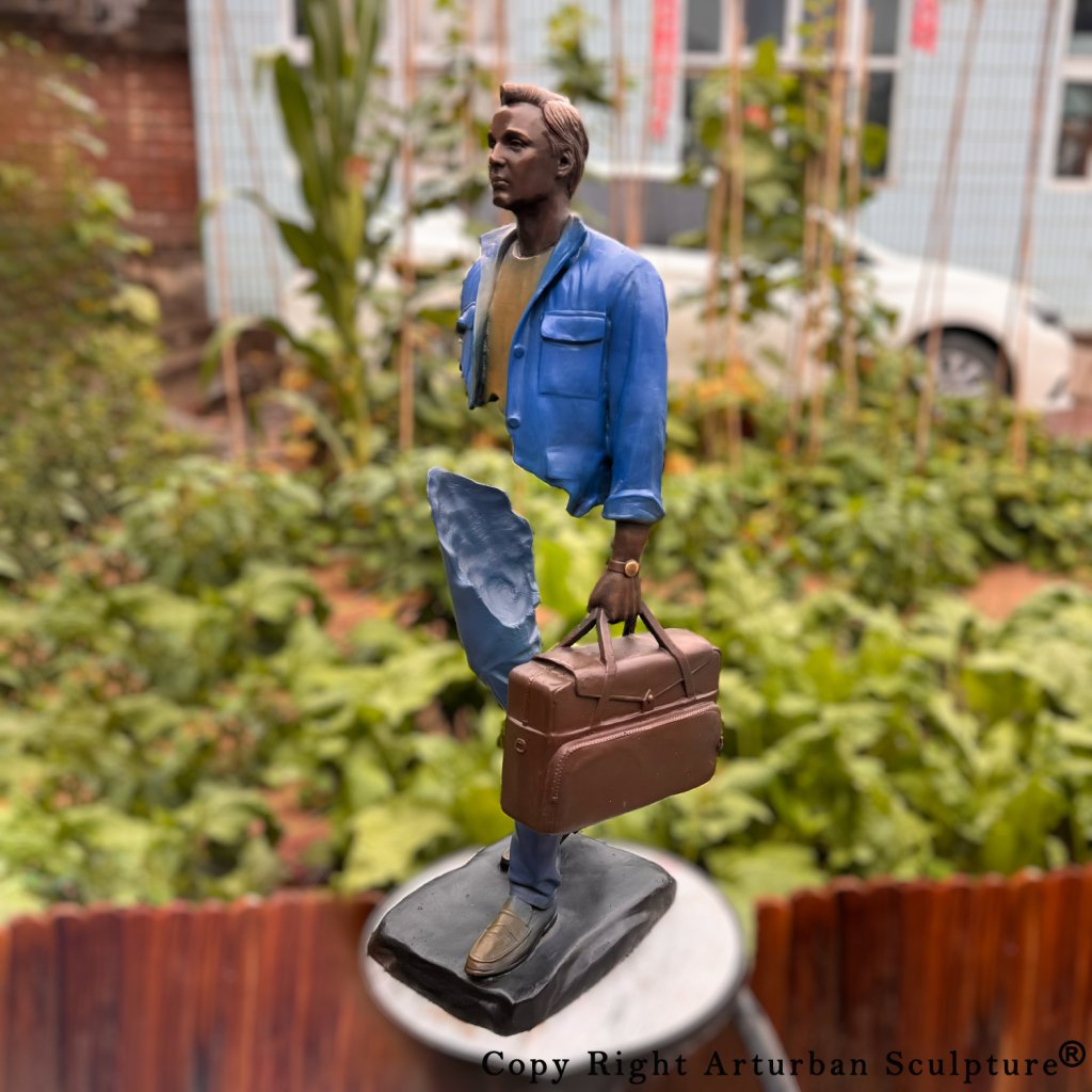 Man with Suitcase Sculpture