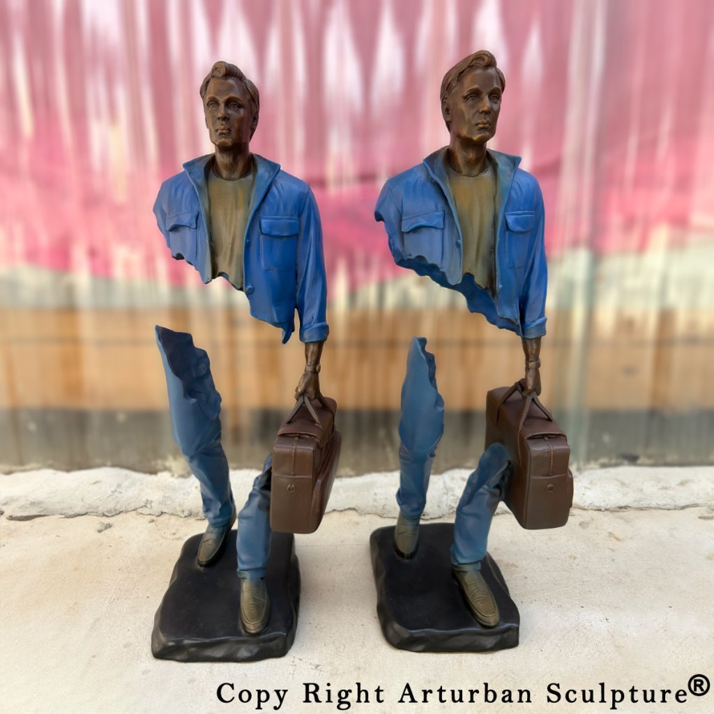 Man with Suitcase Sculpture