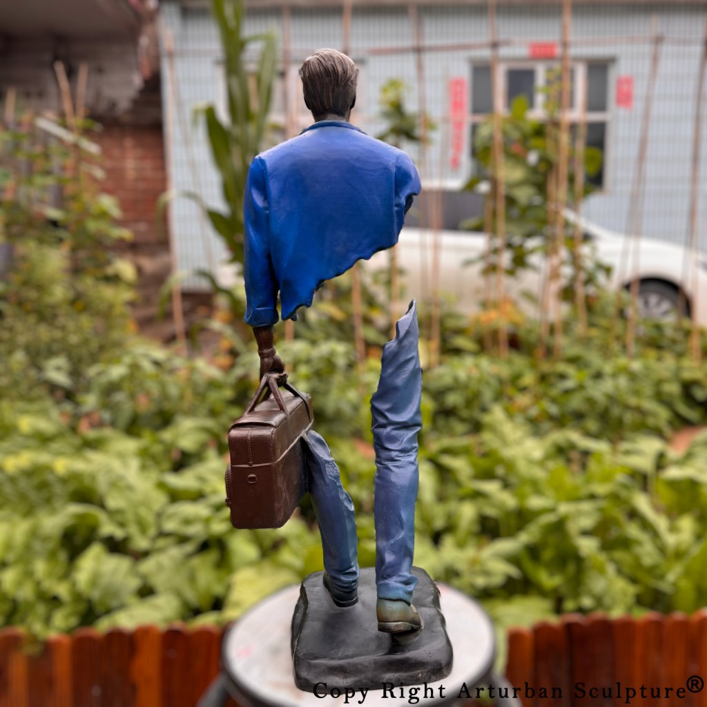 Man with Suitcase Sculpture