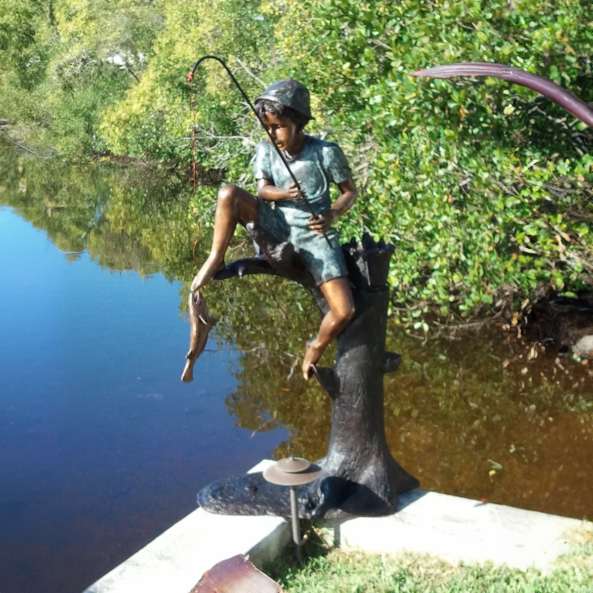 Boy Fishing Water Fountain