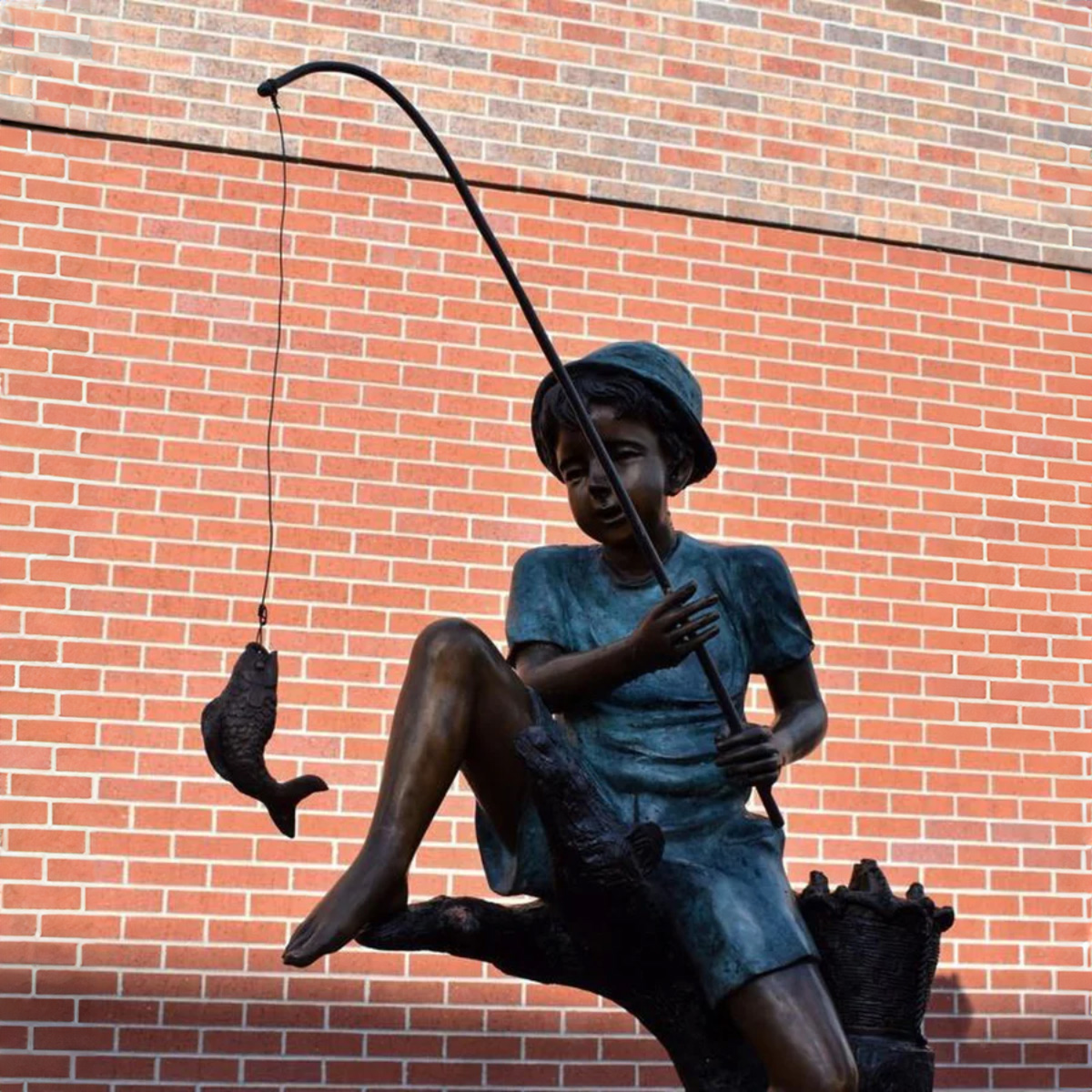 Boy Fishing Water Fountain