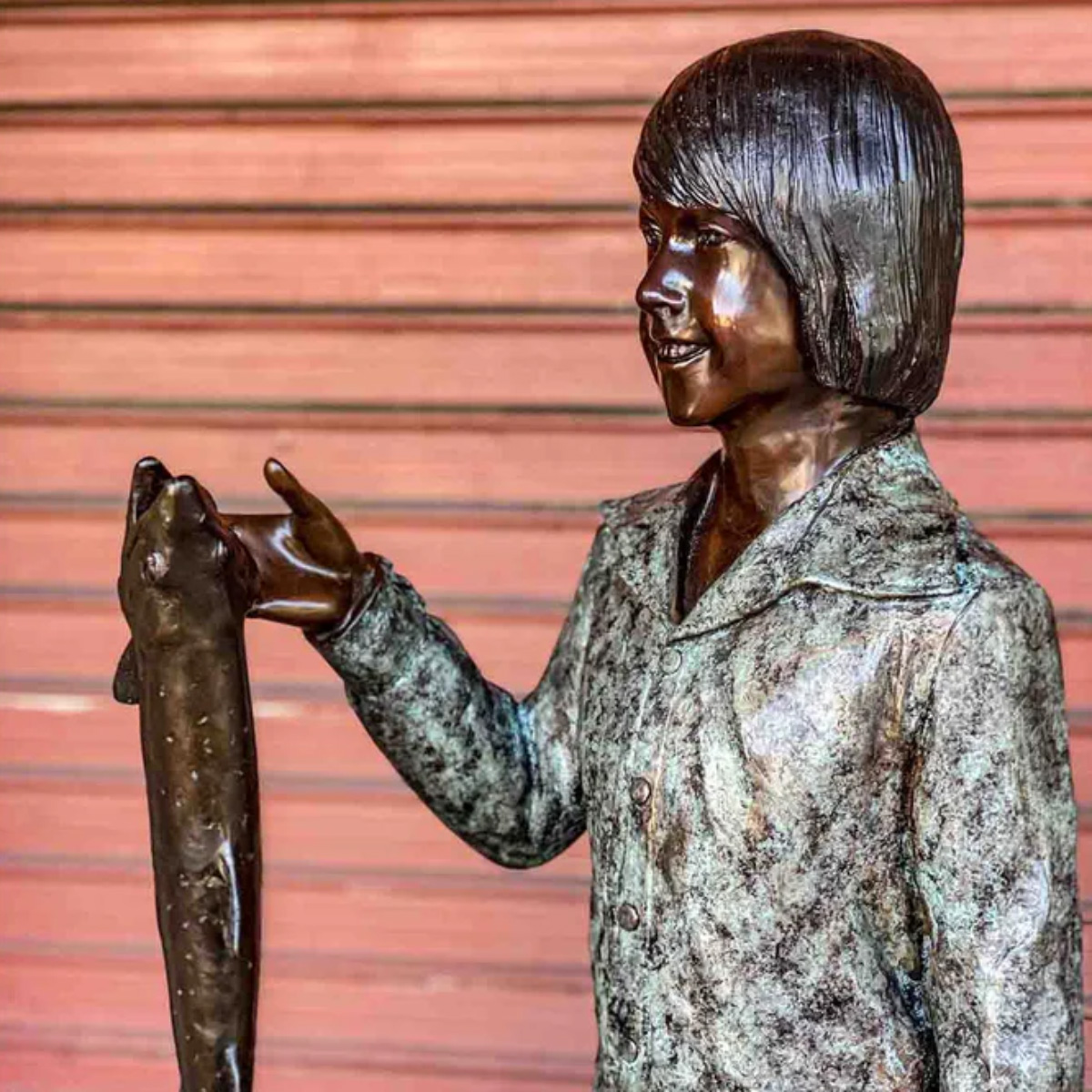 Boy with Fish Statue