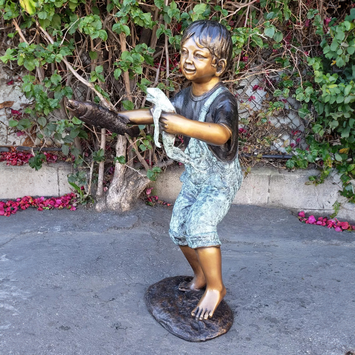 Boy Holding Fish and Frog Statue