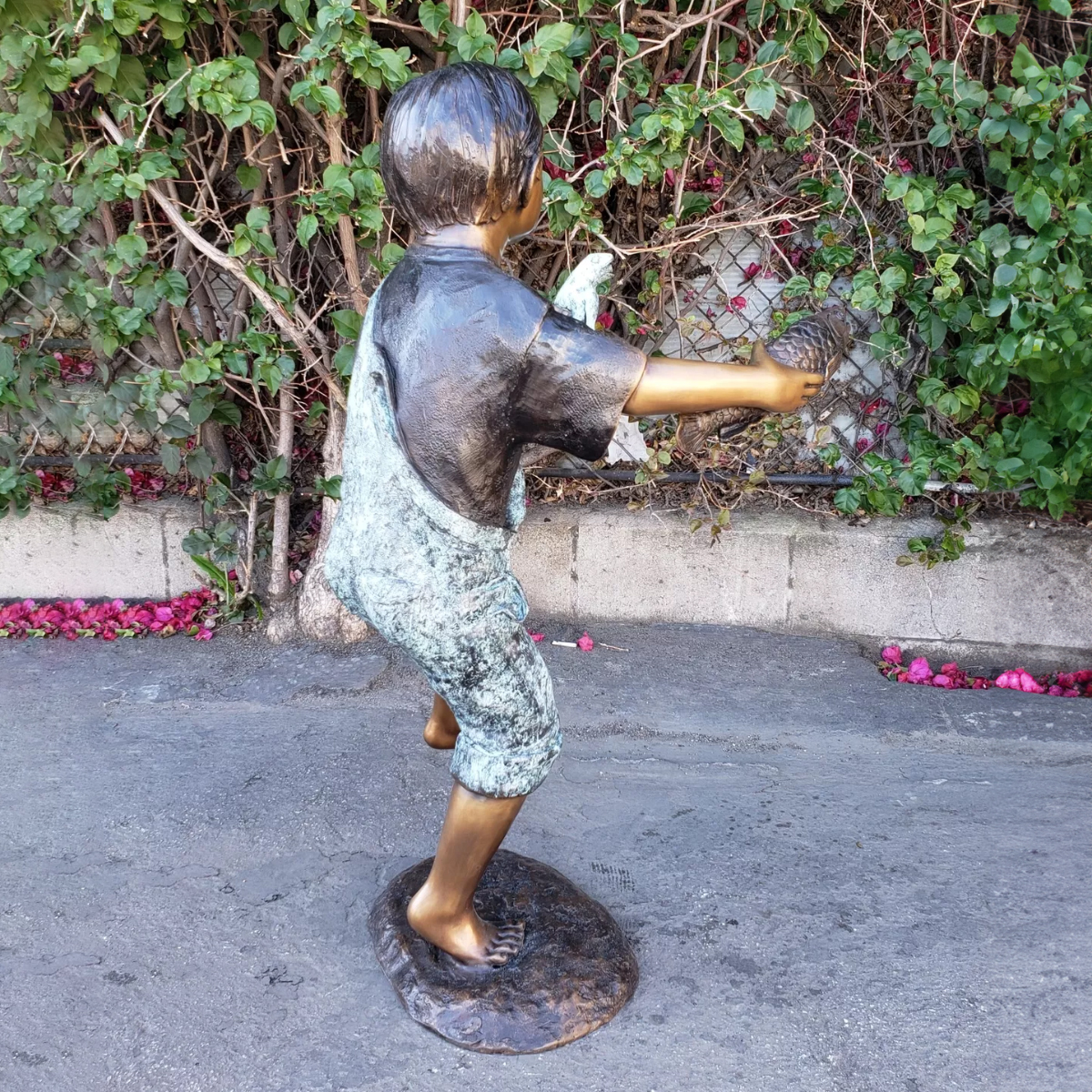 Boy Holding Fish and Frog Statue