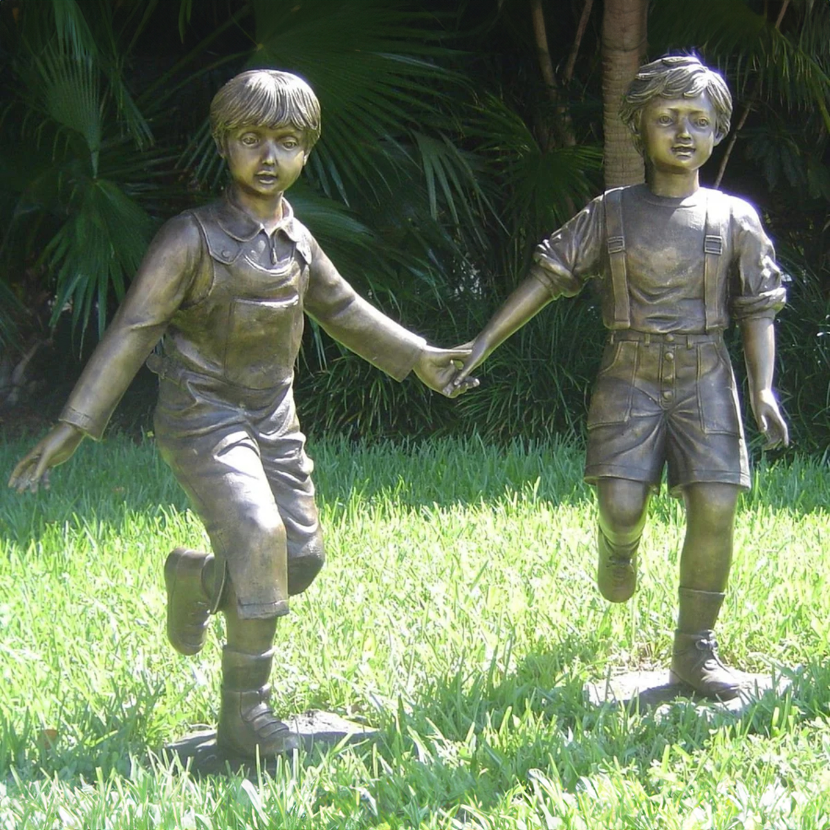 Boy and Girl Holding Hands Statue