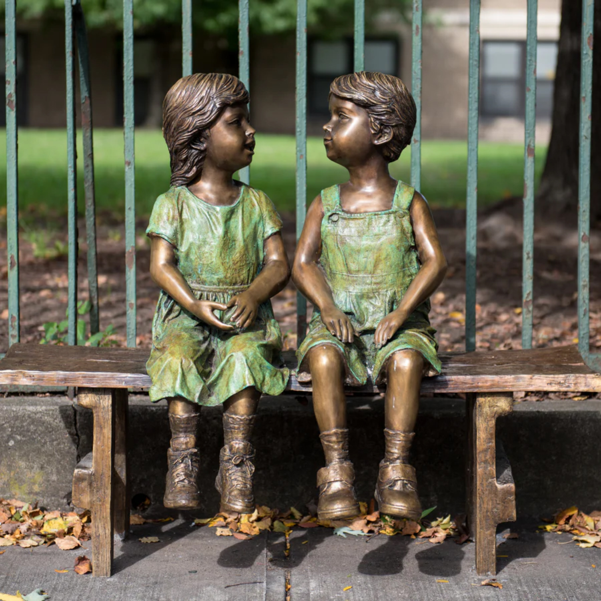 Little Boy and Girl on Bench Statue