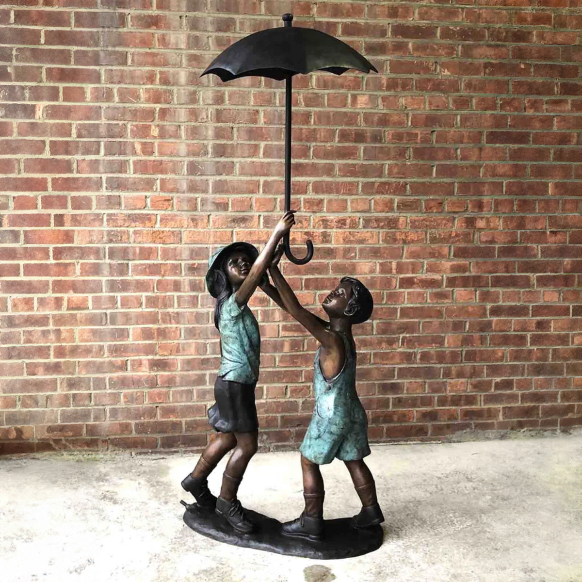 Bronze Boy and Girl Under Umbrella Fountain