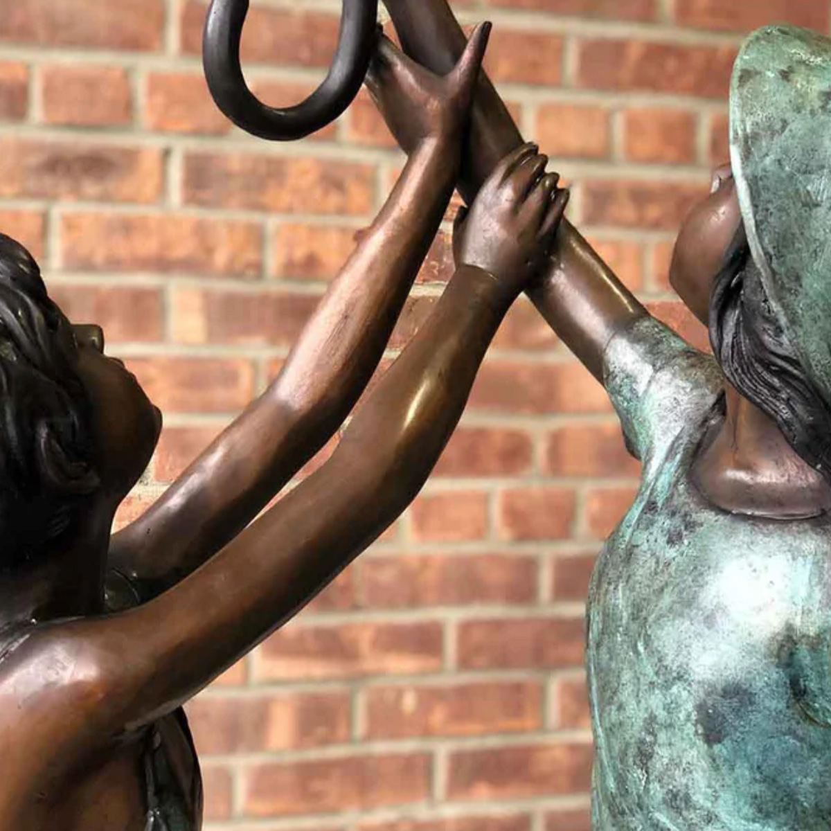 Bronze Boy and Girl Under Umbrella Fountain