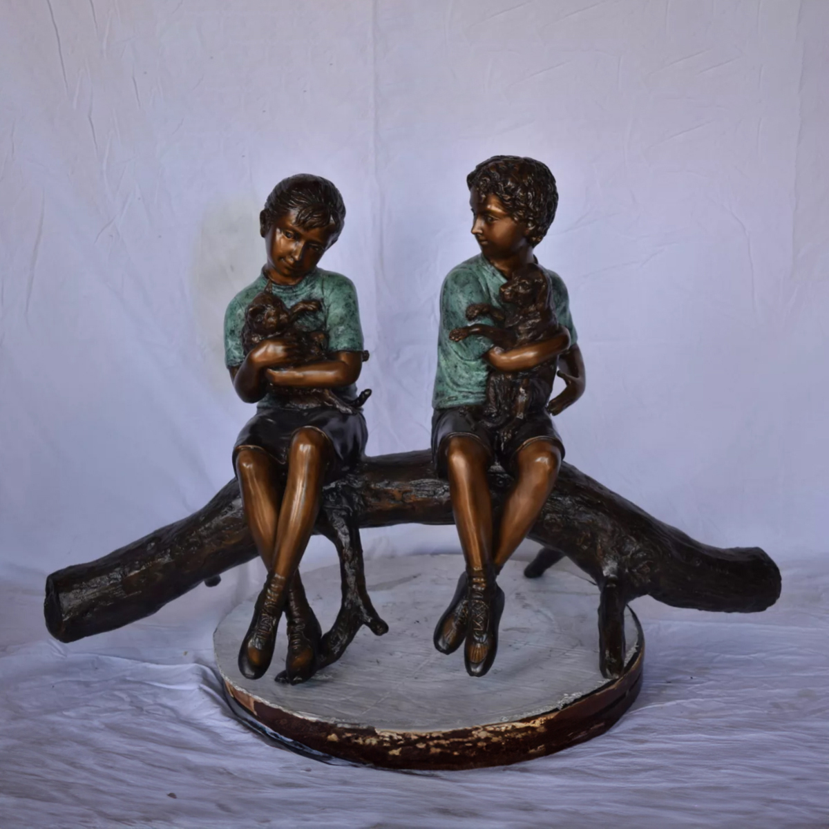 Boy and Girl on Log Statue Sitting