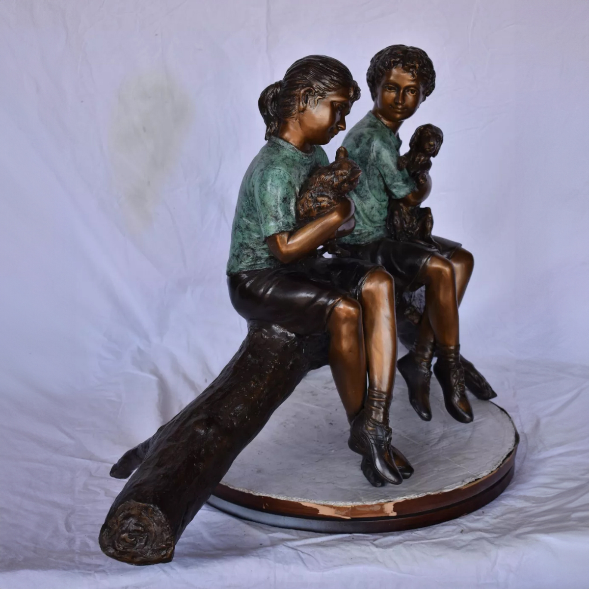 Boy and Girl on Log Statue Sitting