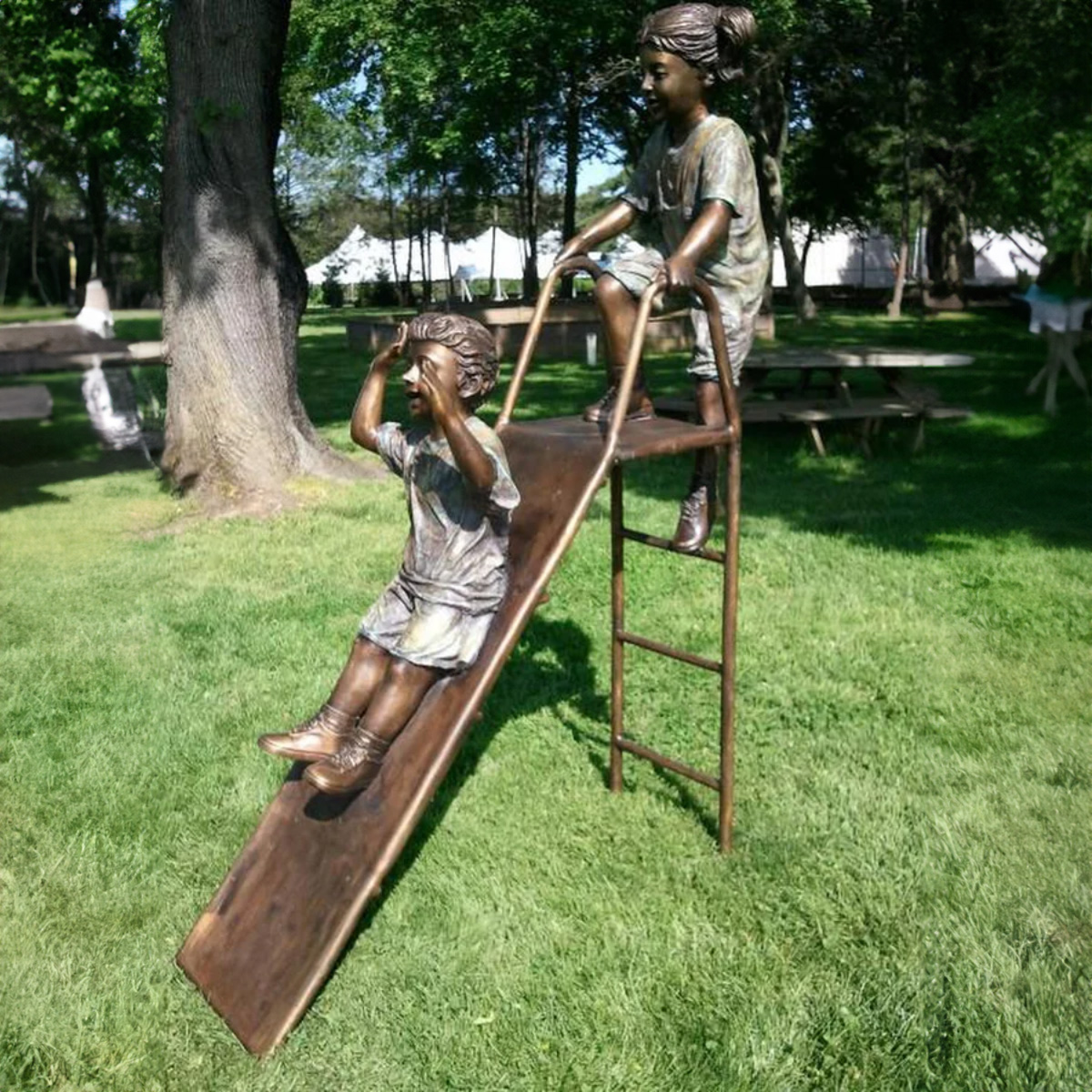 Boy and Girl on Slide Statue