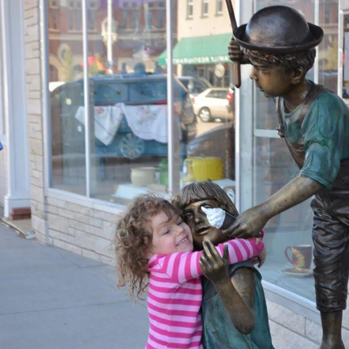 Boy and Girl with Umbrella Fountain