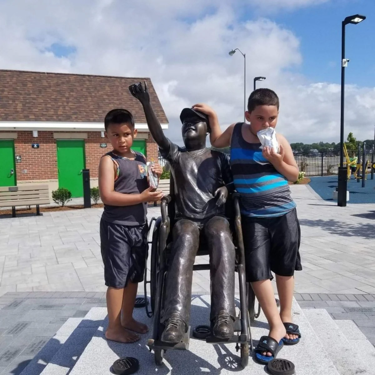 Boy in Wheelchair Statue