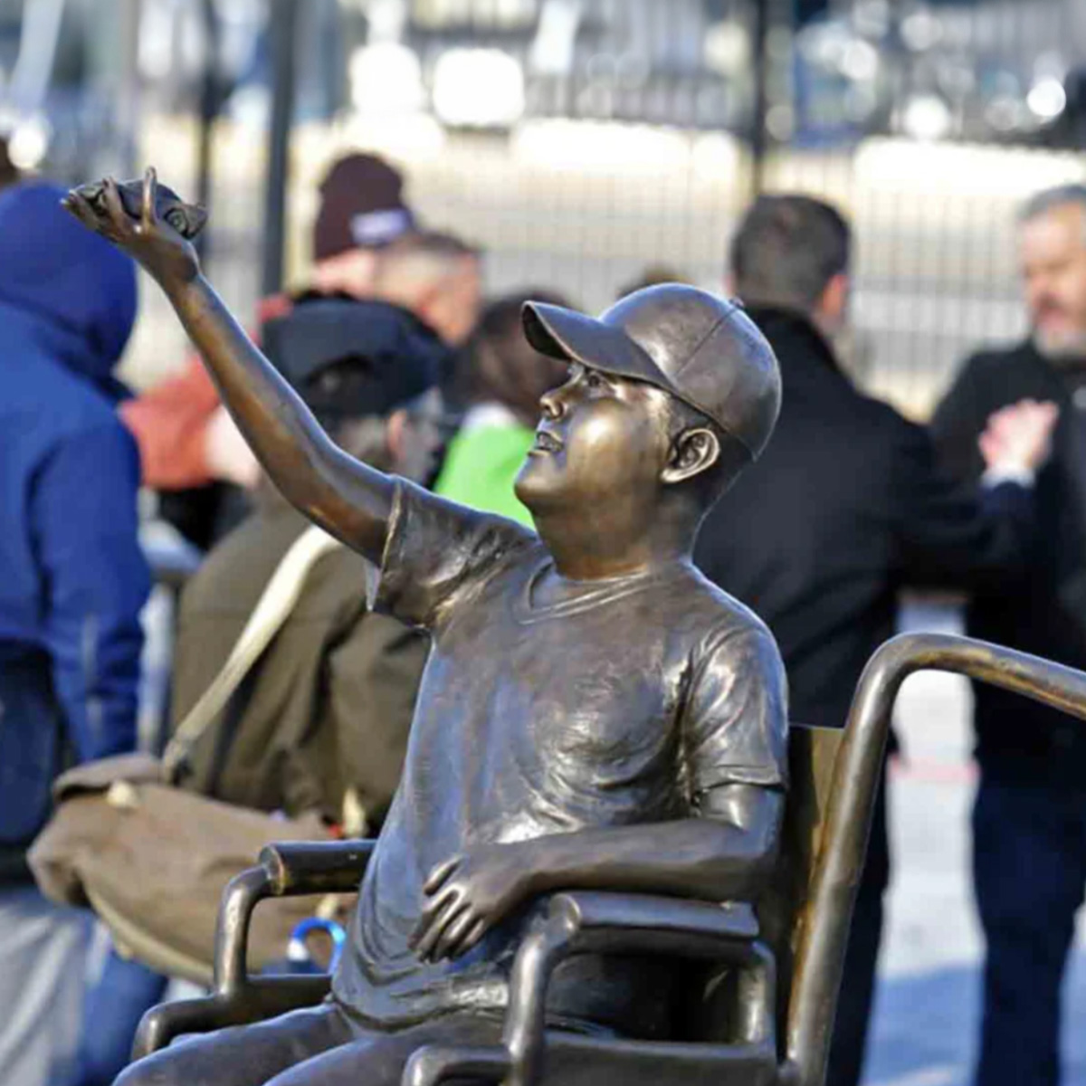 Boy in Wheelchair Statue