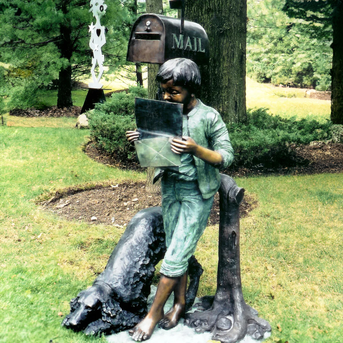 Boy with Dog Mailbox Statue