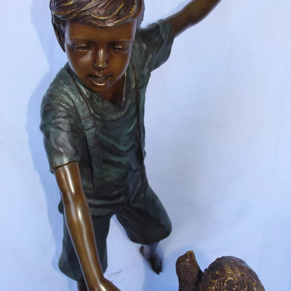 Boy with Dog Sculpture