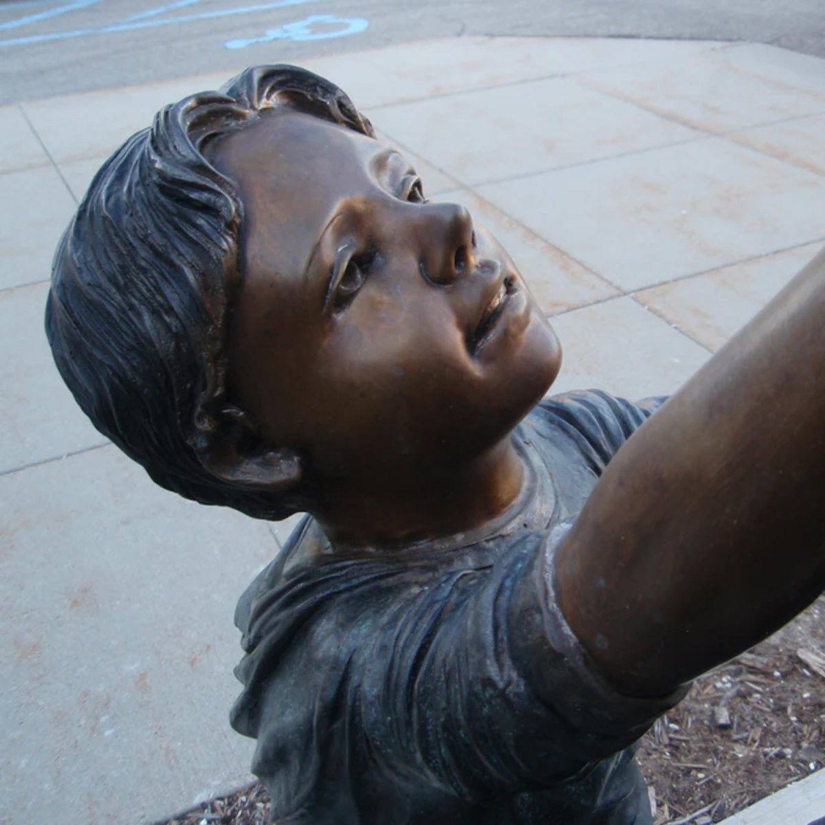 Boys Climbing Mountain Statue