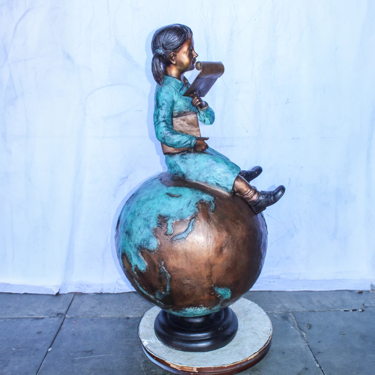 Bronze Girl on Globe Statue