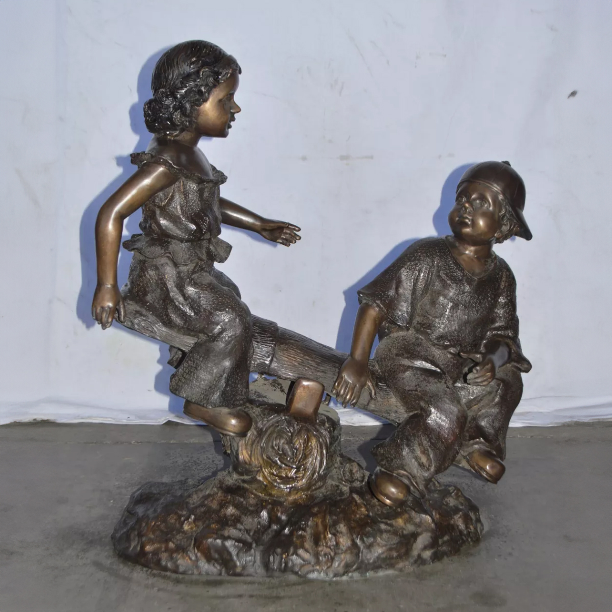 Bronze Playing Seesaw Statue