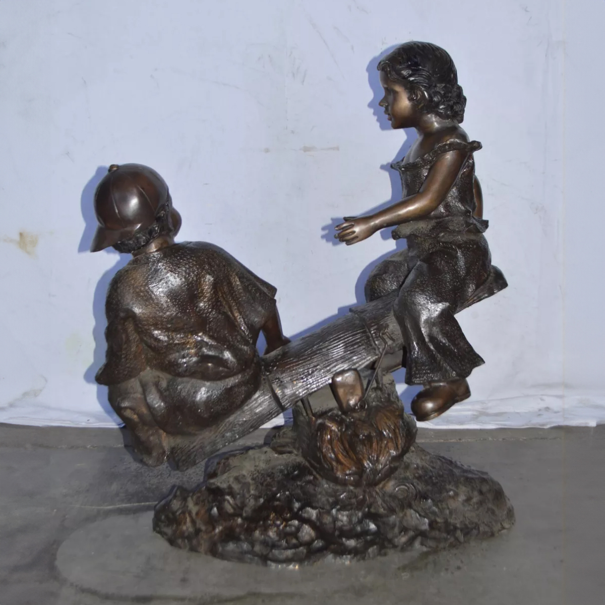 Bronze Playing Seesaw Statue