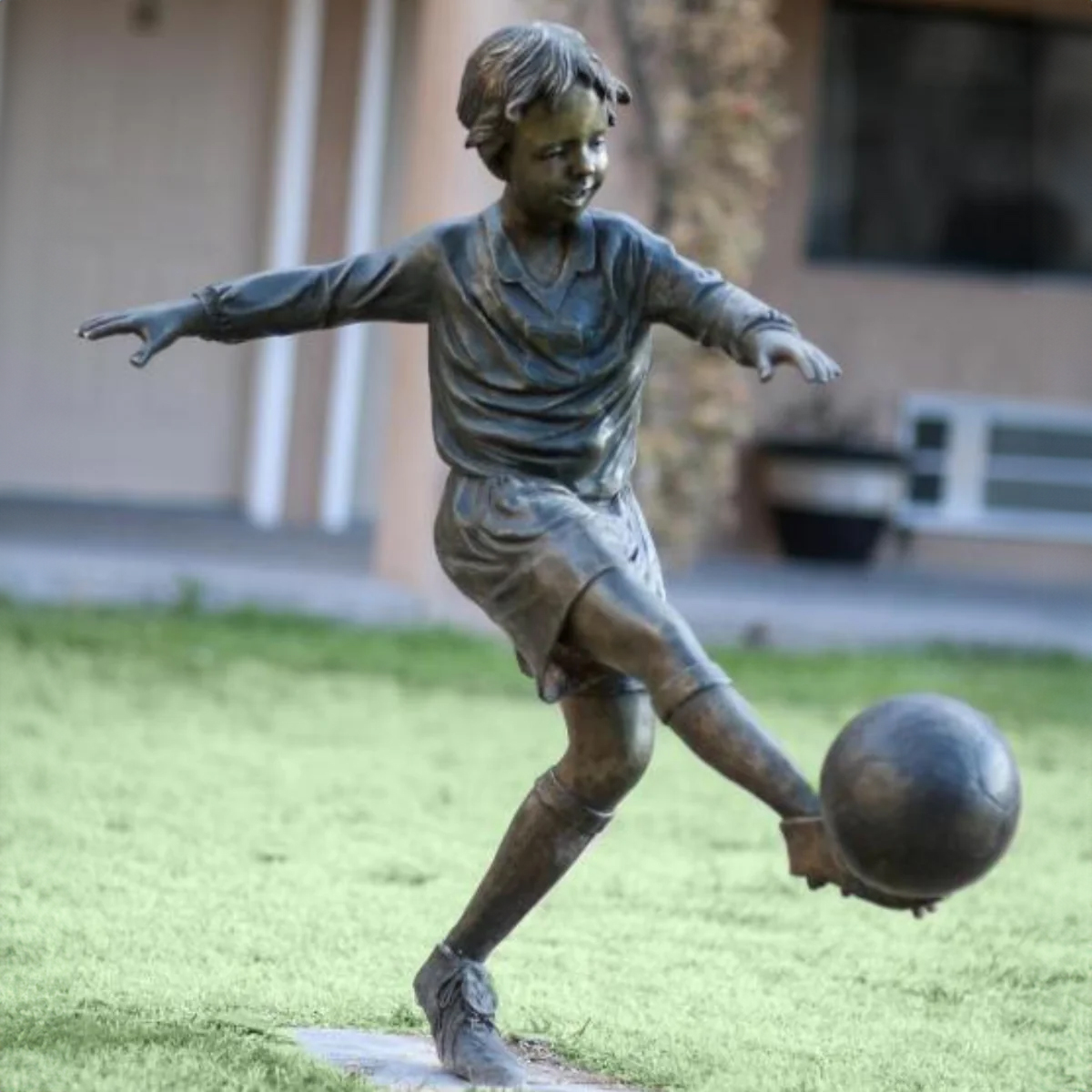 Bronze Statue Of Soccer Player