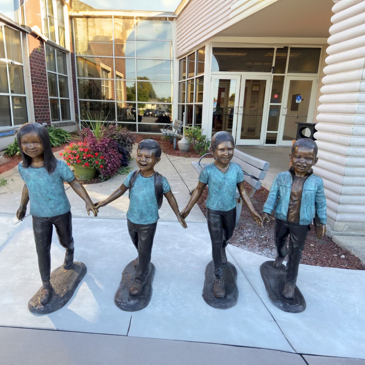 Children Holding Hands Sculpture