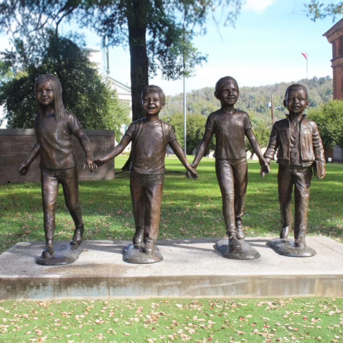 Children Holding Hands Sculpture