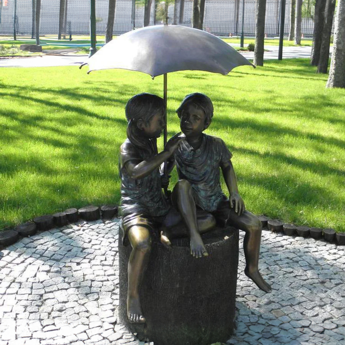 Friends Under Umbrella Statue