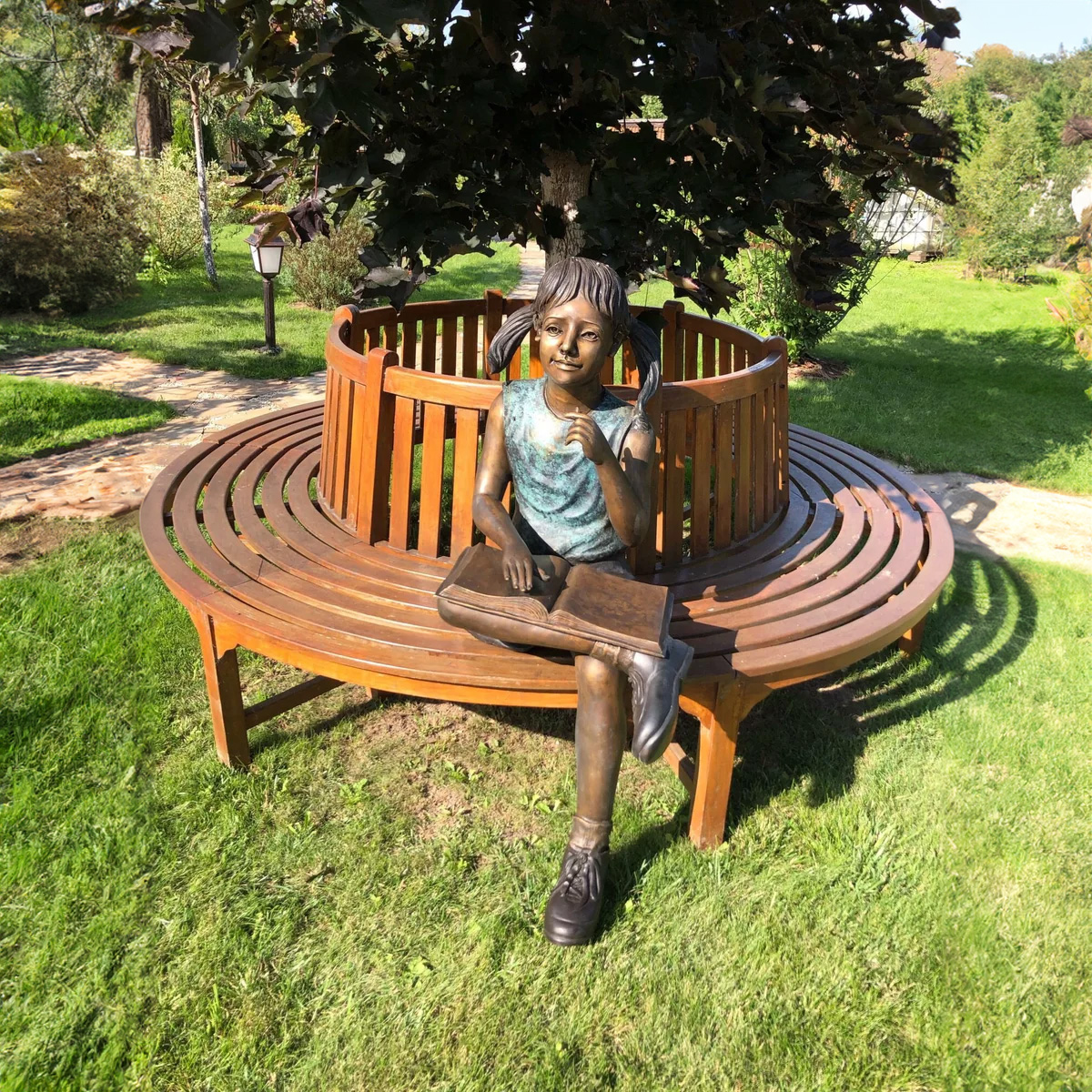 Girl Sitting with Book Statue