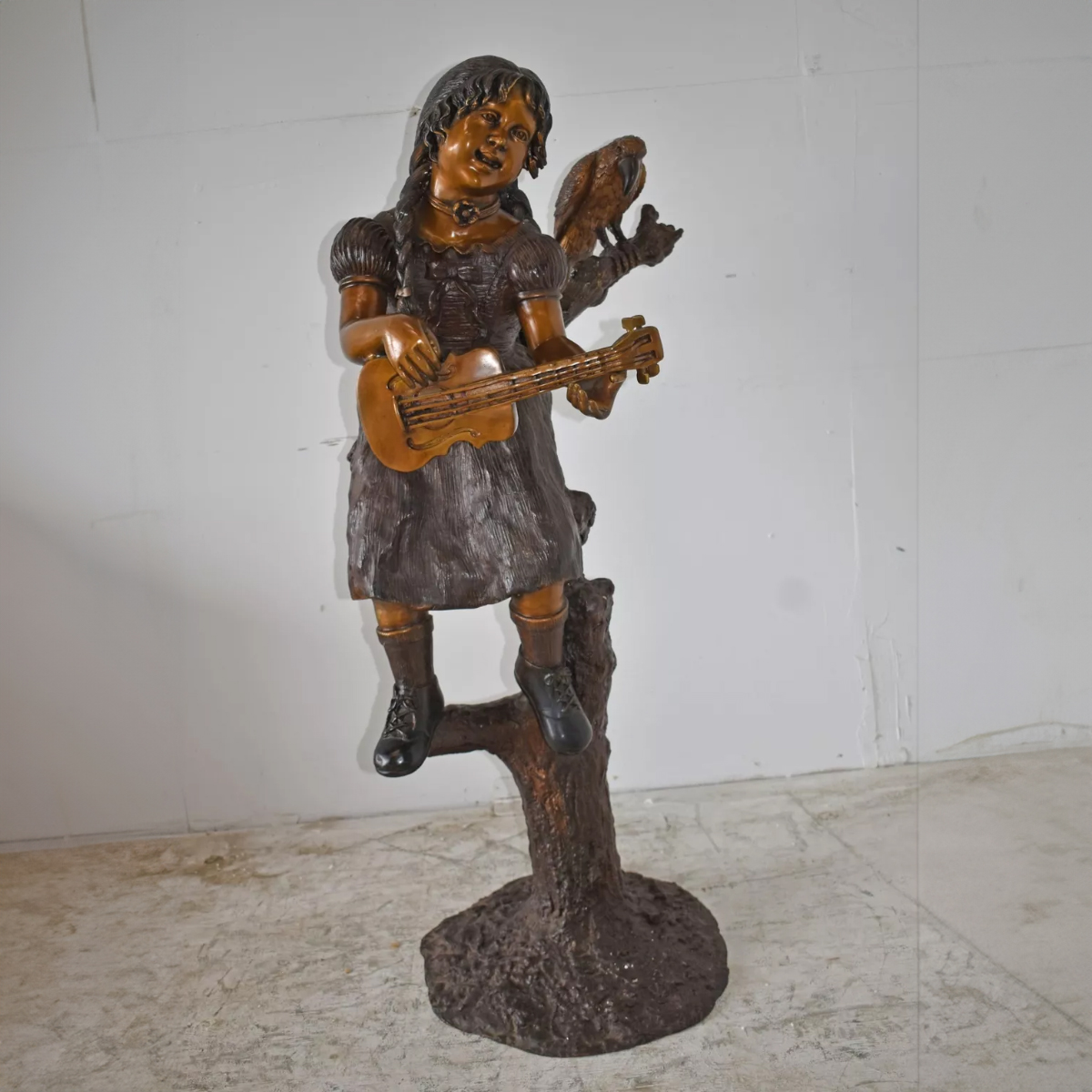 Girl on Tree Sculpture with Ukulele