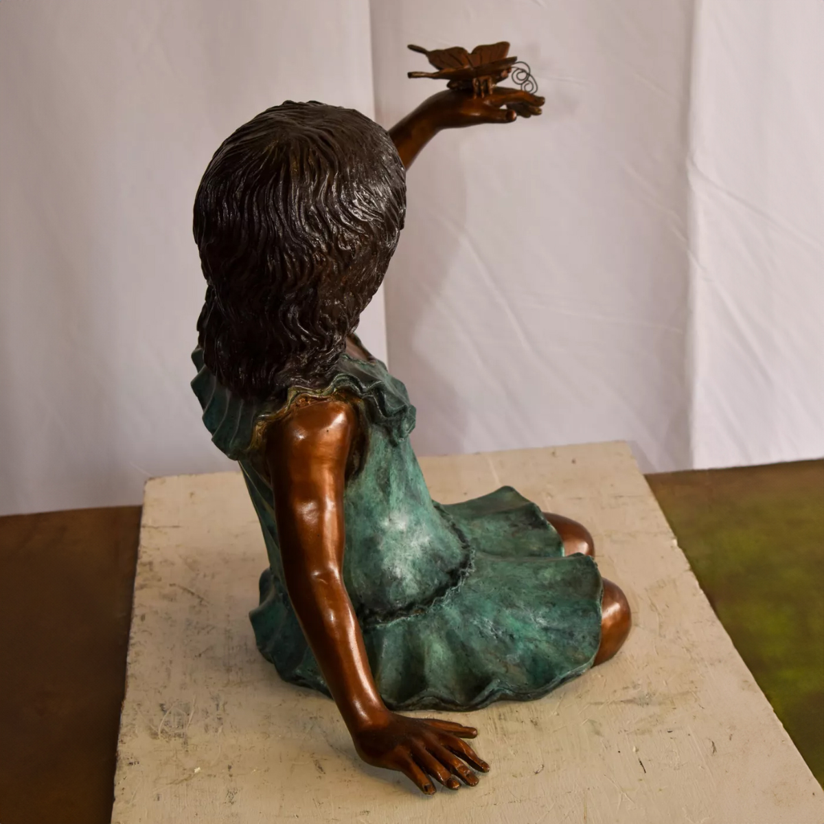 Girl with Butterfly Statue