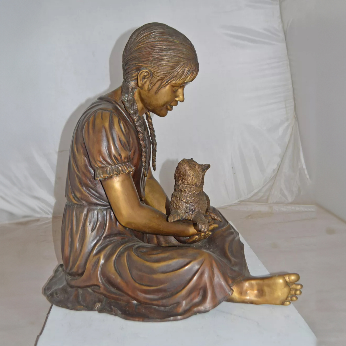 Girl with Cat Statue