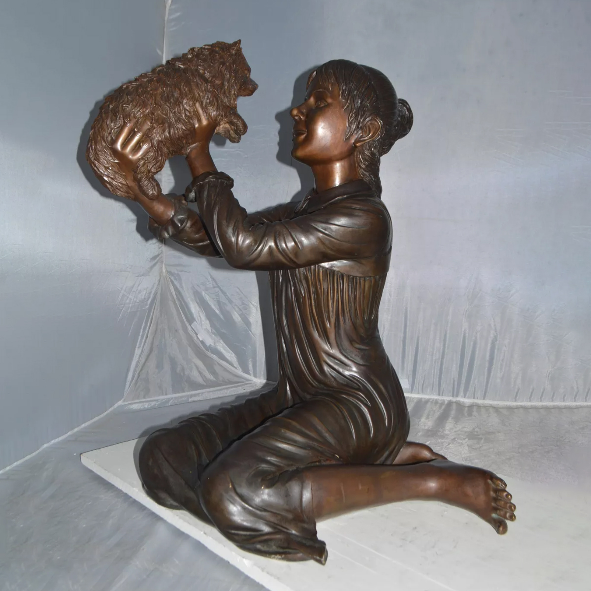 Girl with Dog Statue